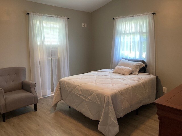 Master bedroom includes full sized bed and dresser - 491 Grace Baptist Church Rd