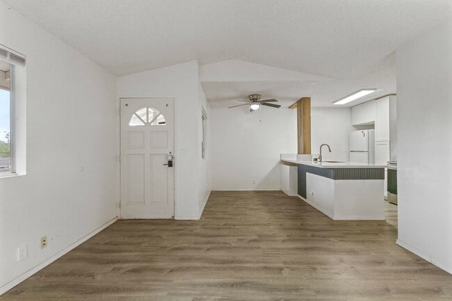 Building Photo - Luxury Living: 2-Bed Condo with 2 Parking Spots & Full Amenities!