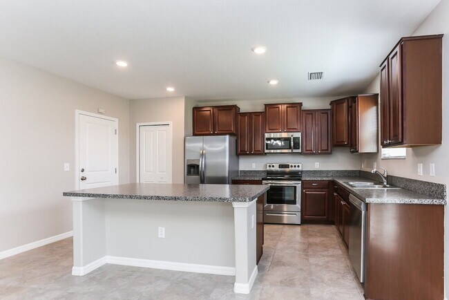 Foto del edificio - 1625 Climbing Dayflower Dr