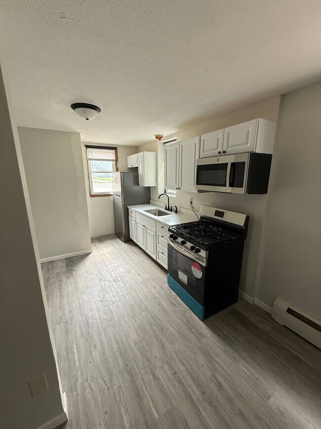Foto del edificio - Tilahun Property - 4 Unit