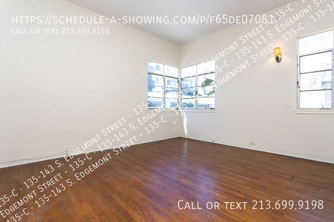Building Photo - NO SECURITY DEPOSIT- LRG 2 BED/1 BA WITH W...