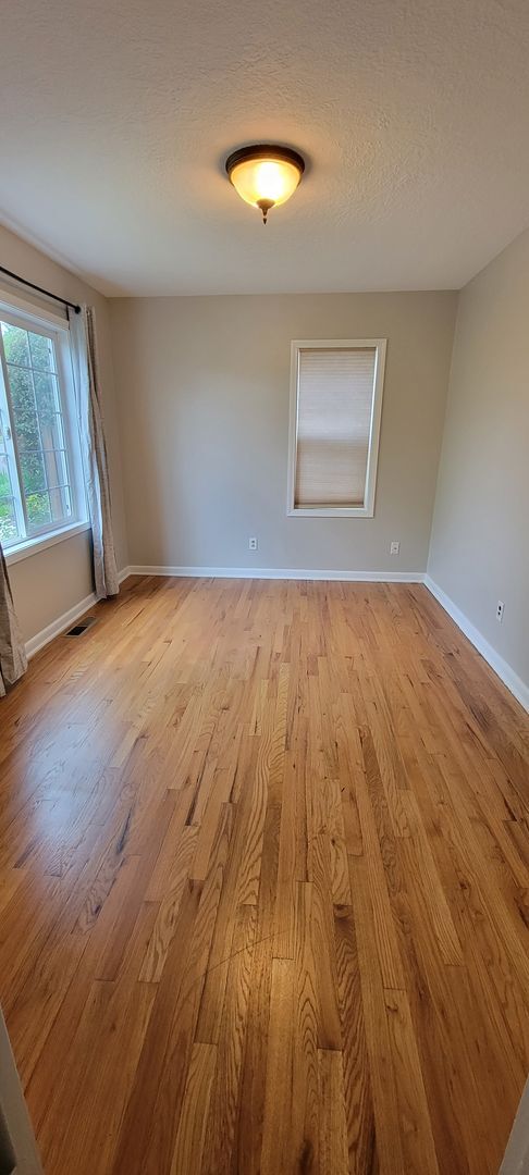 Building Photo - Charming One-Level Home with Hardwood Floors, Stainless Appliances, and Driveway Parking