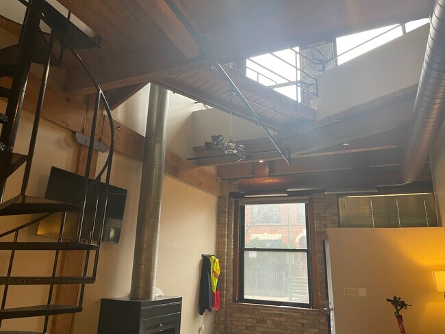 Looking upstairs from kitchen - 2409 N Surrey Ct
