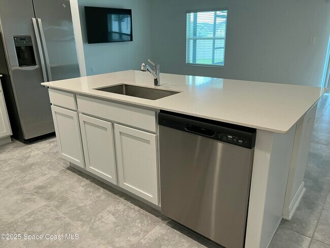 Foto del edificio - 4255 Pebbles Throw Dr
