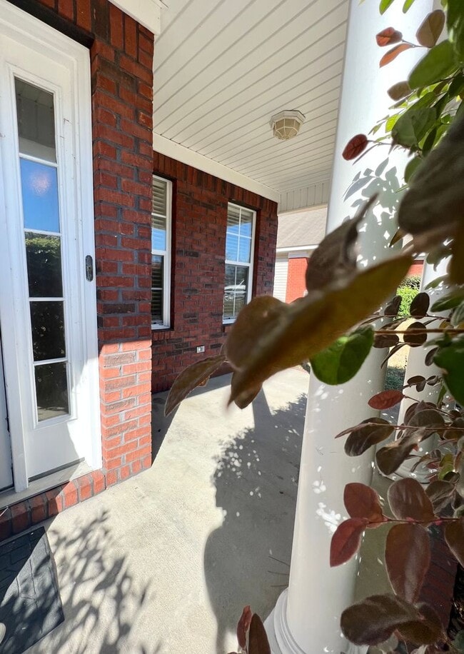 Photo - Screened in Porch and 2 Car Garage! House