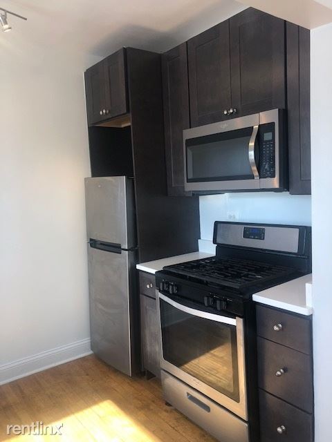 Foto del edificio - 2 br, 1 bath Apartment - 4748 S Woodlawn Ave