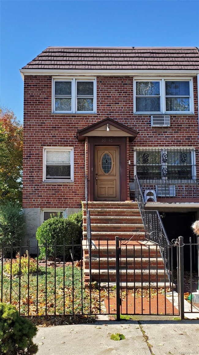 Building Photo - 60-46 69th Pl