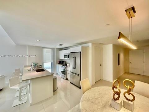 Foto principal - 9940 W Bay Harbor Dr