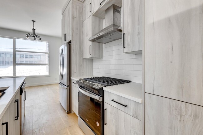 Building Photo - 2144-2151 51 Ave SW
