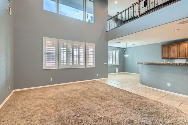 Building Photo - Gorgeous 5 bd, 3 1/2 bath, 3 car in gated community with strip and mountain views!
