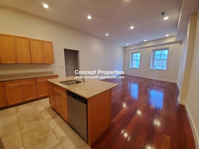 Kitchen open to living room - 520 Harrison Ave