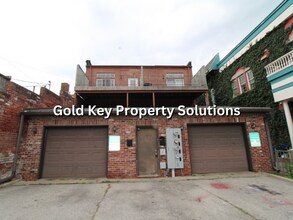Building Photo - 113-115 E 9th St