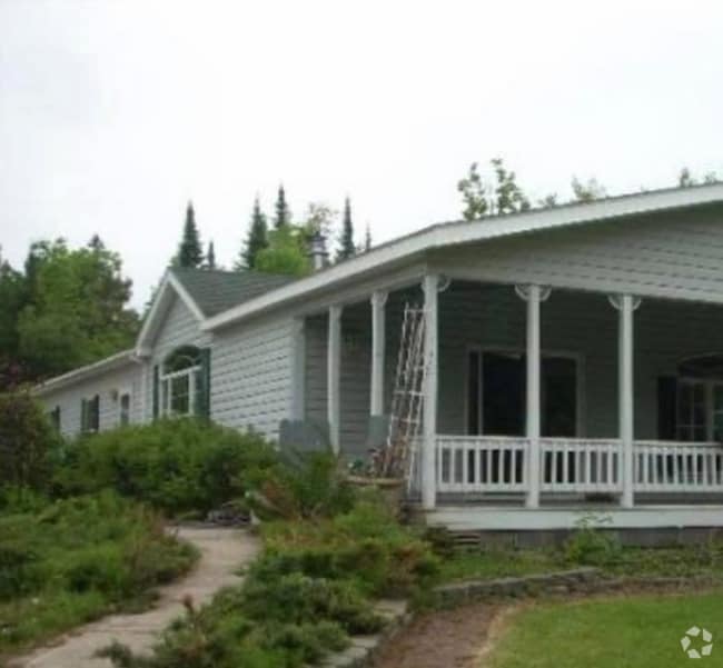 Building Photo - 8677 W Lake Rd