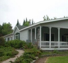 Building Photo - 8677 W Lake Rd