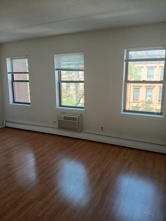 Very sunny living room - 112 W 128th St