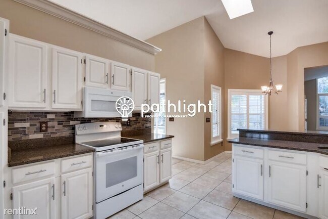 Building Photo - 4 br, 3 bath House - 1058 Almond Tree Cir ...