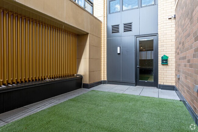 Pet Exercise Area - Nolan Mains Residences at 50th & France