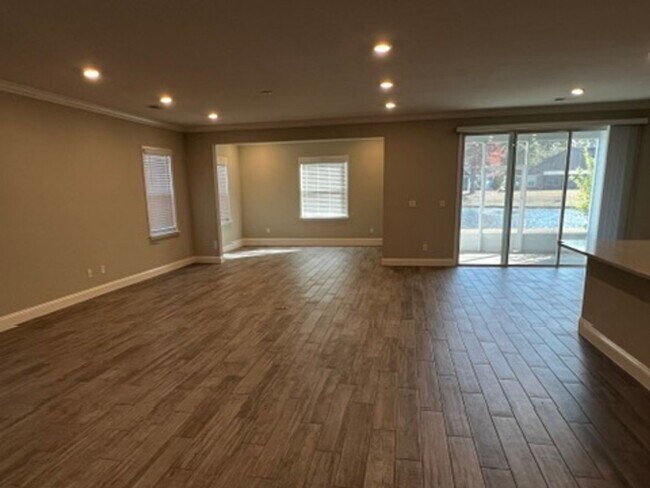 Building Photo - FOUR BEDROOMS and THREE BATHS For Rent