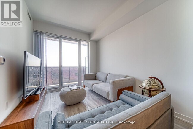 Photo du bâtiment - 55 Cooper St