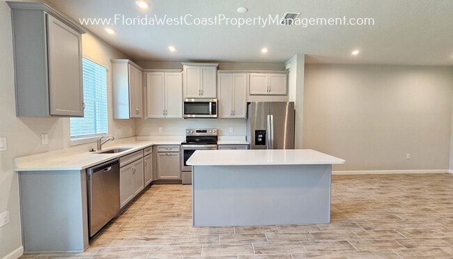 Building Photo - SUPER 3 BEDROOM/2.5 BATH TOWNHOME AVAILABLE IN HARMONY! TERRIFIC LWR LOCATION!