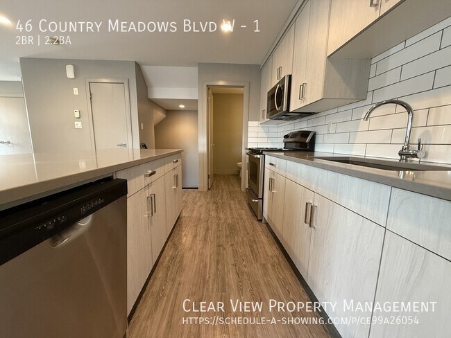 Building Photo - ?? Stunning 2-Bedroom Townhouse with 4 Bathrooms and Modern Design!