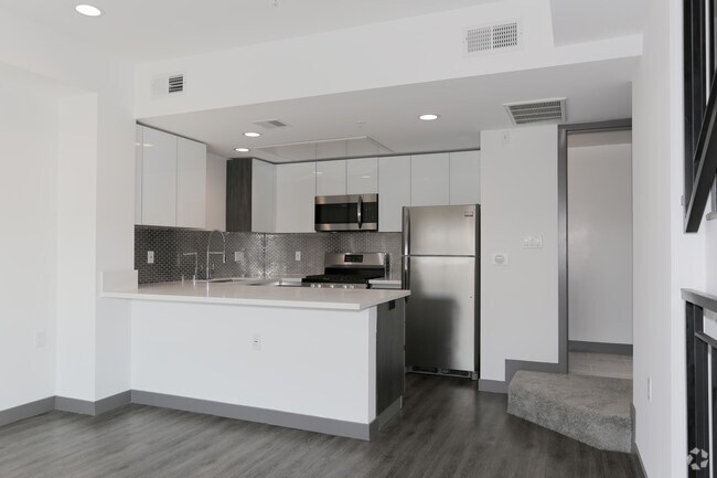 1BR, 1.5BA - 800 SF - 8748 Reading - Townhouse Apartments