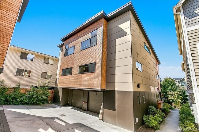 Back of unit with garage - 6536 42nd Ave SW