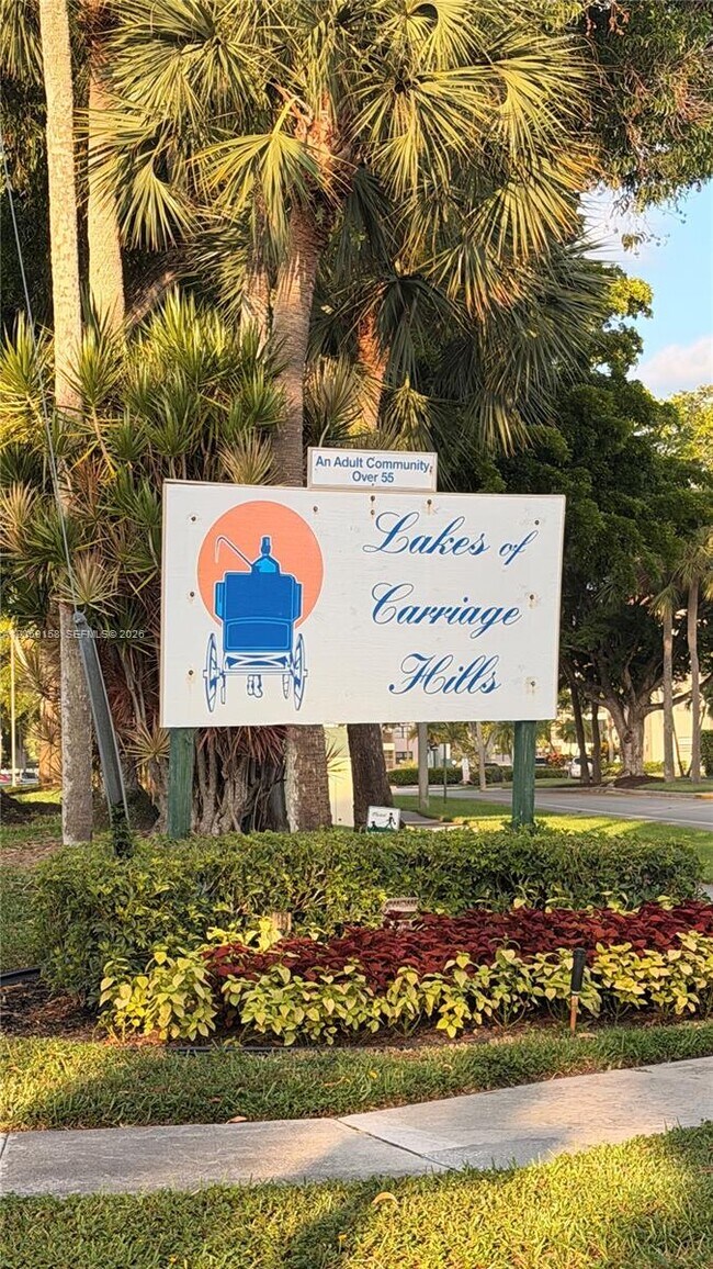 Building Photo - 6090 N Sabal Palm Blvd