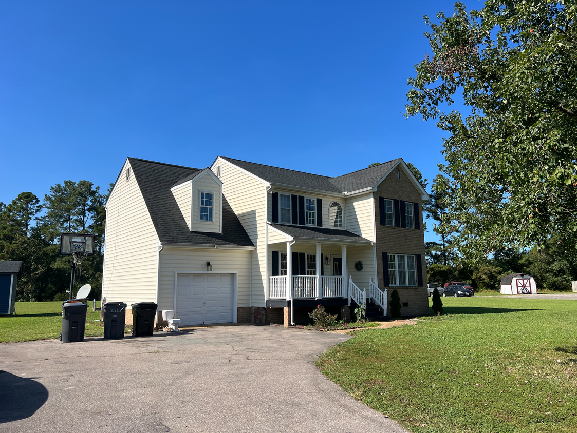 Front of House - 9292 Woody Ct