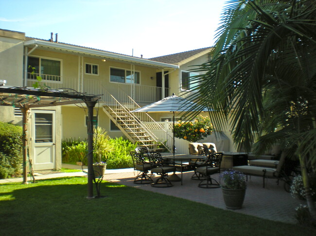 View of 4-Plex from backyard. Unit D is on 2nd floor on the right - 18630 Del Rio Pl