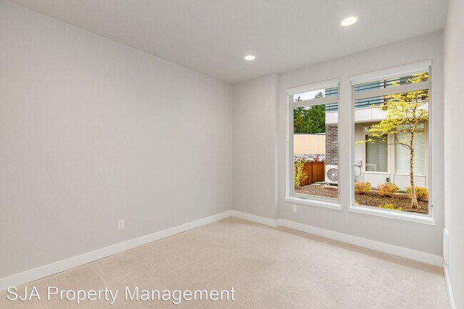 Foto del edificio - 4 br, 3.5 bath House - 11415 117th Ln NE #1