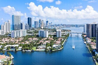 Building Photo - 19380 Collins Ave