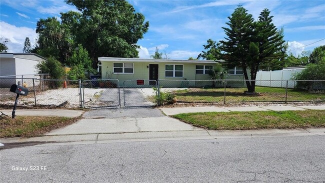 Building Photo - 4014 W Mango Ave