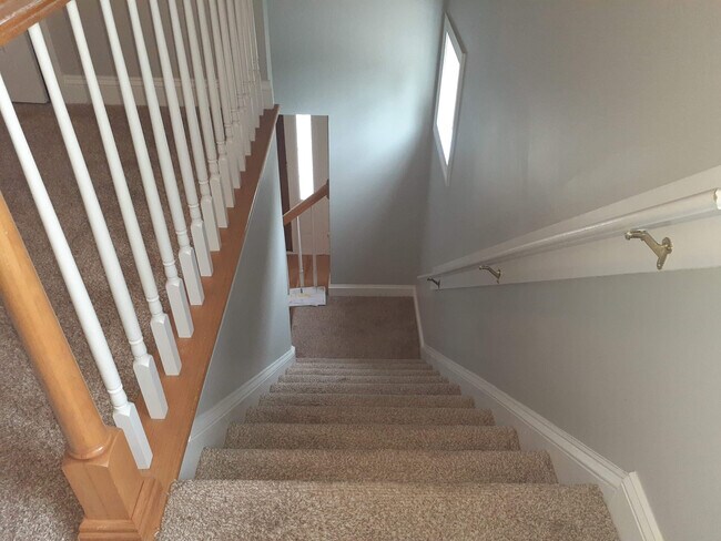 Building Photo - 220 Whistling Swan Dr