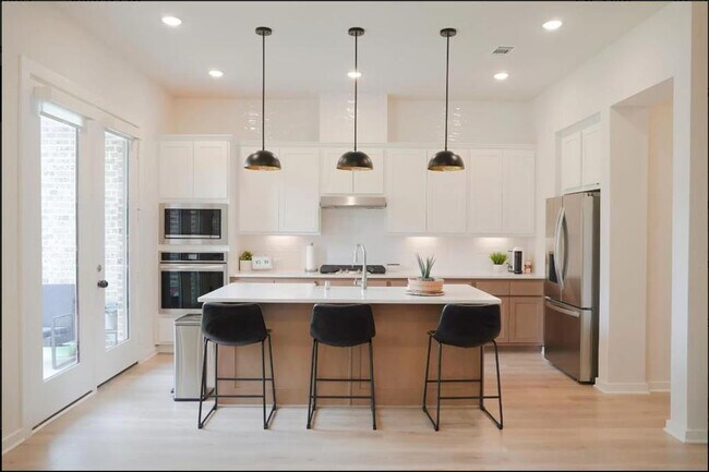 Foto del edificio - 6518 Scarlet Pond Ln