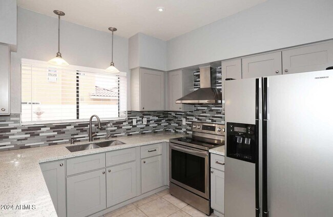 Building Photo - 4437 E Villa Theresa Dr