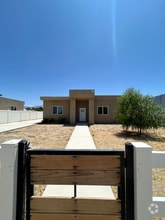 Building Photo - 9306 E Ave T 6