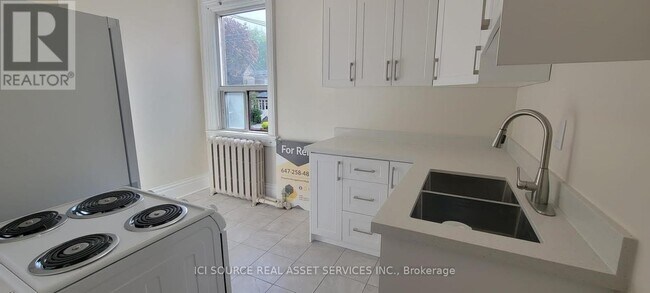 Photo du bâtiment - 360 Gerrard St E