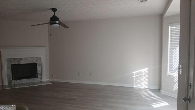 Building Photo - 5677 Wind Gate Ln