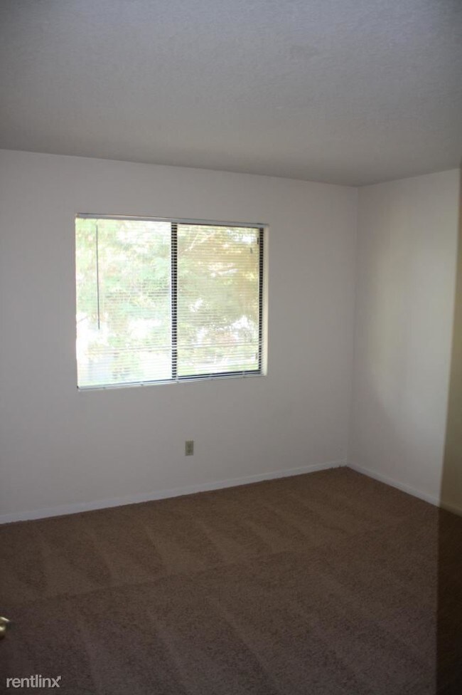 Building Photo - 7456 Sandalwood Dr