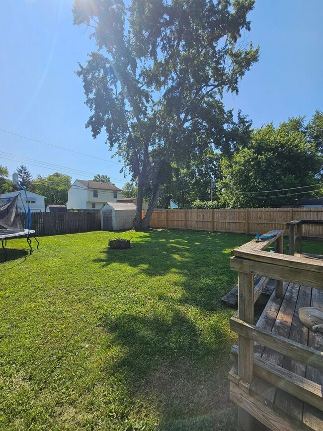 Privacy Fenced in back yard. Shed and trampoline will stay. - 3400 Burbank Rd