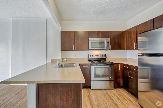 Kitchens are complete with stainless steel appliances - Renaissance Tower