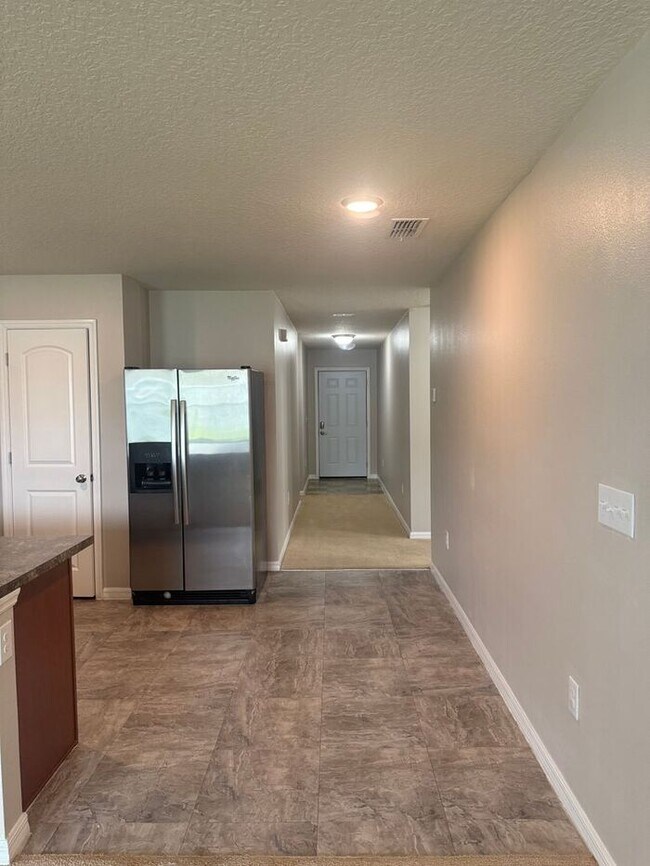 Foto del edificio - Comfortable and spacious Home in Poinciana Village 7