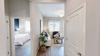Located in Mesa, Arizona, this thoughtfully designed single-story home offers 2 bedrooms and 2 bathrooms across a comfortable, efficiently laid-out floor plan. The living room features wood-look flooring, large windows with blinds and sheer curtains that invite abundant natural light, a ceiling fan, and direct access to an outdoor area through a glass door, creating a bright and airy atmosphere.

The kitchen is a functional highlight, showcasing white cabinetry, granite-style countertops, stainless steel appliances including a refrigerator, range, microwave, and dishwasher, along with recessed lighting and multiple windows that keep the space well-lit.

The primary bedroom is a comfortable retreat with a bold accent wall, ceiling fan, wood-look flooring, and ample natural light from large windows. It features dual closets with built-in rods and shelving for generous storage. The primary bathroom includes a glass-enclosed walk-in shower, granite countertops, and bright windows. The second bedroom is cozy and light-filled with a ceiling fan and neutral tones. The second bathroom features clean, modern finishes. Three hallways connect the spaces efficiently throughout the home.