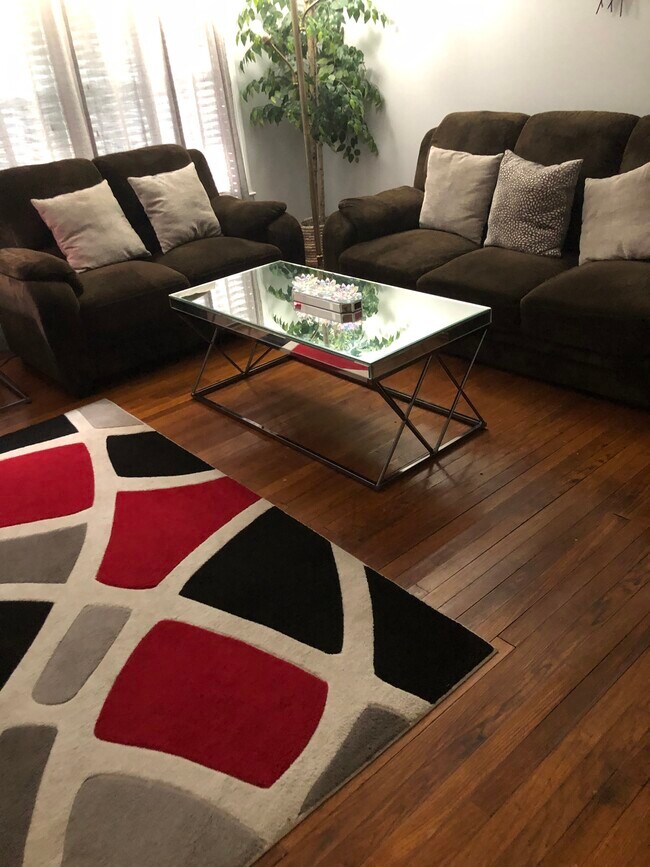 living room with hardwood floors - 2876 Cohassett Ln