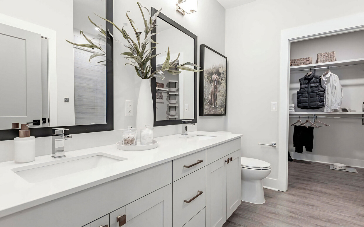 Luxurious bathroom with double vanity and spacious walk-in closet - Novel Cary