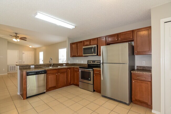 Foto del edificio - 8710 Morrison Oaks Ct