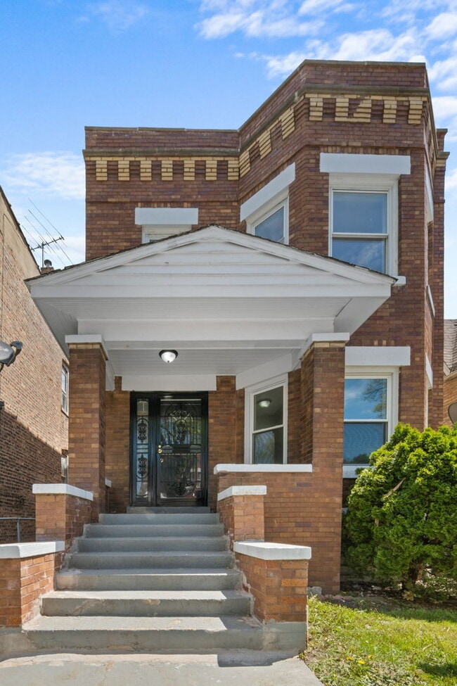 Building Photo - 1031 N Drake Ave