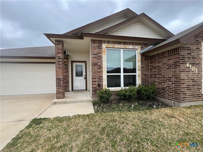 Foto del edificio - 6103 Cactus Flower Ln