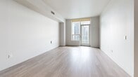 Located at 1133 S Hope St in Downtown Los Angeles, this modern 2-bedroom, 2-bathroom residence offers a well-designed layout with contemporary finishes throughout. Light wood-tone flooring flows seamlessly across the living areas and bedrooms, complementing the clean white walls and modern aesthetic.

The open kitchen is thoughtfully appointed with flat-front grey cabinetry extending to the ceiling, a sleek grey tile backsplash, white quartz countertops, and a full suite of stainless steel appliances including a gas range, dishwasher, microwave, and refrigerator.

The living area is bright and open, with access to a private balcony through floor-to-ceiling glass doors that frame sweeping Downtown LA skyline views. Both bedrooms are well-proportioned, with the spacious primary bedroom offering generous closet space and abundant natural light. The second bedroom features large windows with additional city views.

The primary bathroom includes a sleek glass-enclosed walk-in shower, a wide vanity with dual sinks, and large-format tile flooring. The second bathroom offers a tub-shower combination with a modern vanity and large mirror. Clean lines, neutral tones, and quality finishes define the overall ambiance of this stylish Downtown Los Angeles residence.